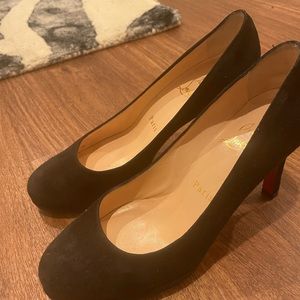 Black suede platform Christian Louboutin heels.  Size 35.5